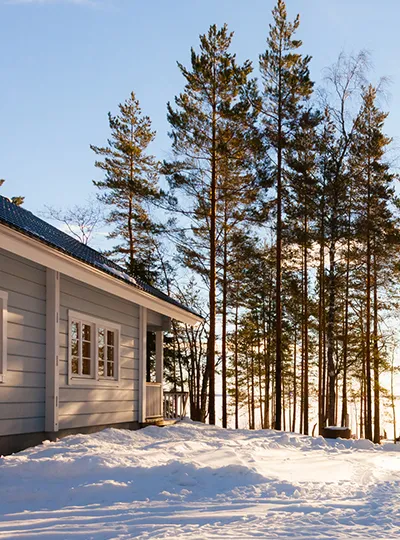 Snow-covered cottage near Bruce County